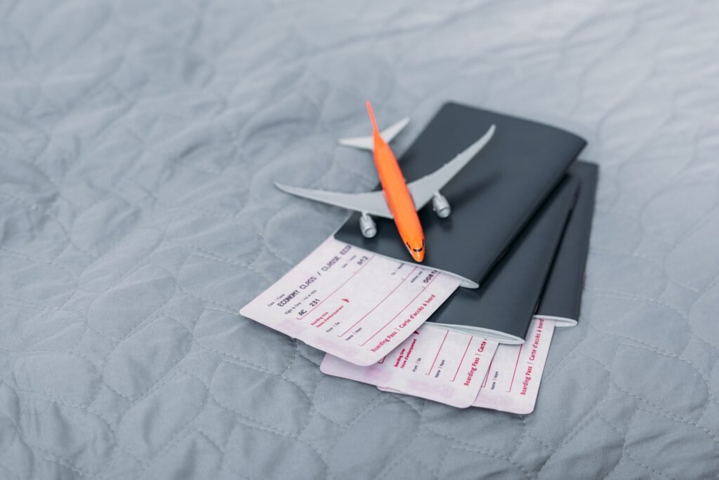 composition of flight tickets with toy airplane